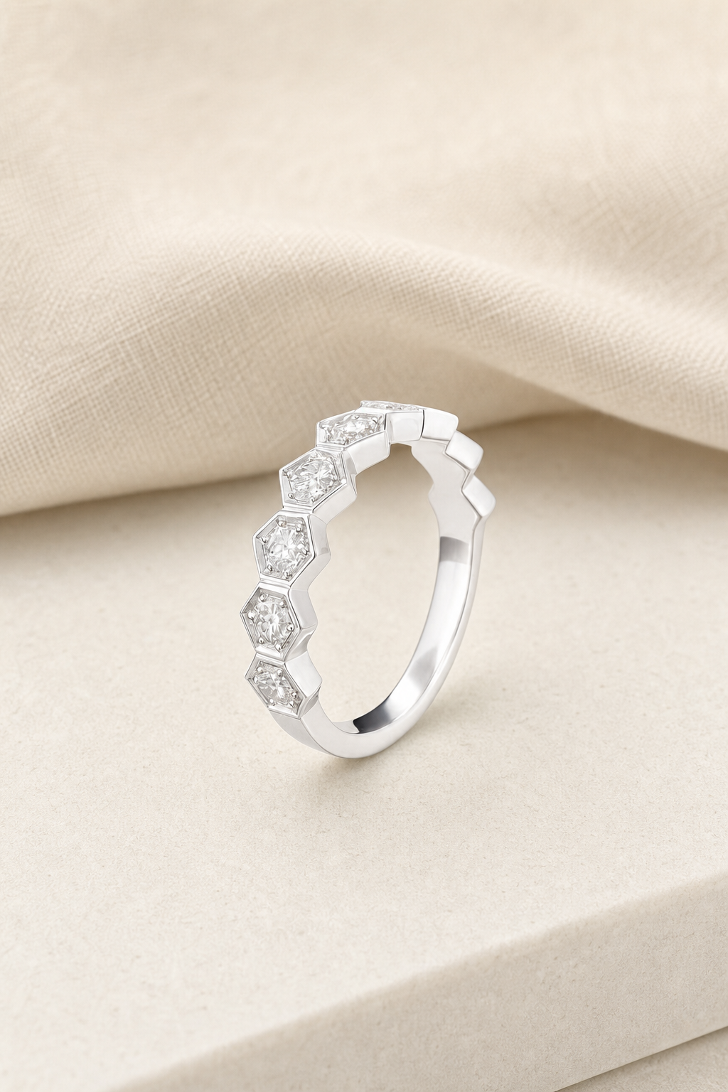 Impimo 0.7 CT Lab-Grown Diamond Round Cut Ring - 925 Sterling Silver with 18K White Gold Plating | display view on ivory linen