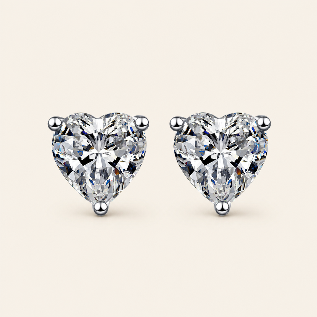 Impimo 1/2/4 CT Moissanite Heart Cut Earrings - 925 Sterling Silver with 18K White Gold Plating | packshot on ivory