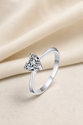 Impimo 0.5/1/2 CT Moissanite Heart Cut Ring - 925 Sterling Silver with 18K White Gold Plating | display view on ivory linen