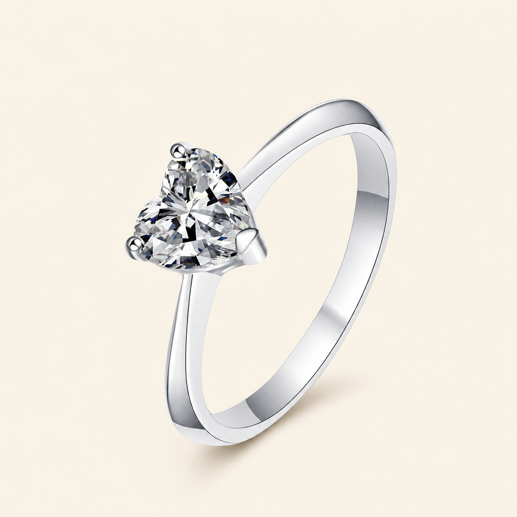 Impimo 0.5/1/2 CT Moissanite Heart Cut Ring - 925 Sterling Silver with 18K White Gold Plating | packshot on ivory