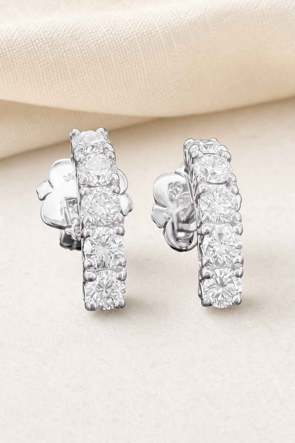 Impimo 1.1 CT (Pair) Lab-Grown Diamond Round Cut Earrings - 925 Sterling Silver with 18K White Gold Plating | close-up detail of the setting