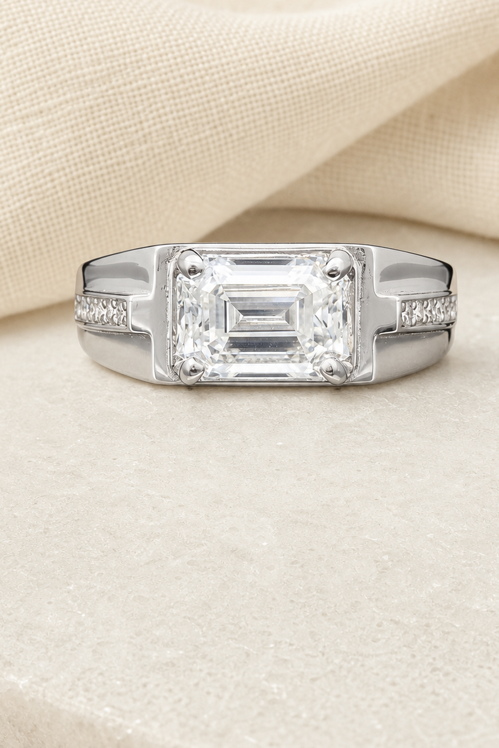 Impimo 1/2 CT Moissanite Emerald Cut Ring - 925 Sterling Silver with 18K White Gold Plating | close-up detail of the setting