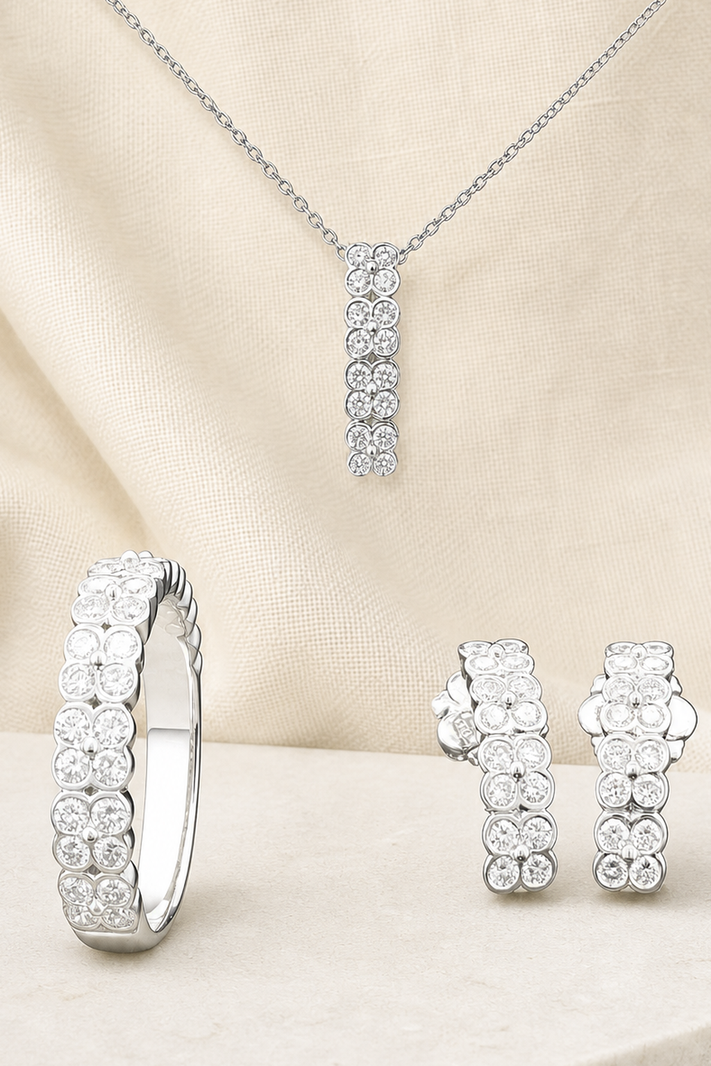 Impimo Lab-Grown Diamond Jewelry Set - Ring, Pendant & Earrings - Round Cut - 925 Sterling Silver with 18K White Gold Plating | close-up detail of the setting