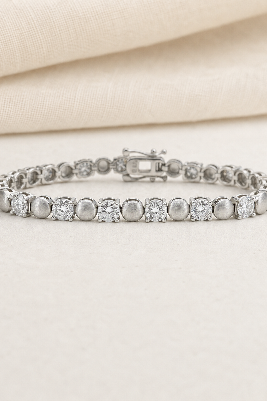 Impimo 8 CT (0.5 CT) Moissanite Round Cut Bracelet - 925 Sterling Silver with 18K White Gold Plating | close-up detail of the setting
