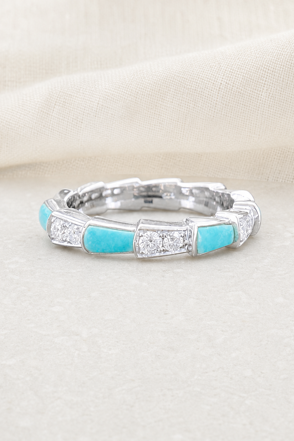 Impimo 0.35 CT Moissanite & Turquoise Geometric Ring - 925 Sterling Silver 18K White Gold | close-up detail of the setting