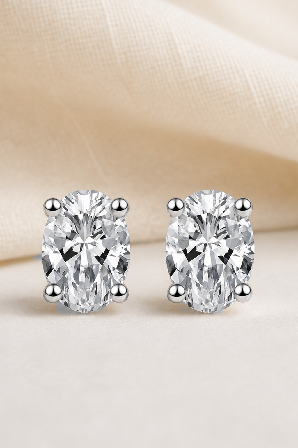 Impimo 1/2/4 CT Moissanite Oval Cut Earrings - 925 Sterling Silver with 18K White Gold Plating | close-up detail of the setting