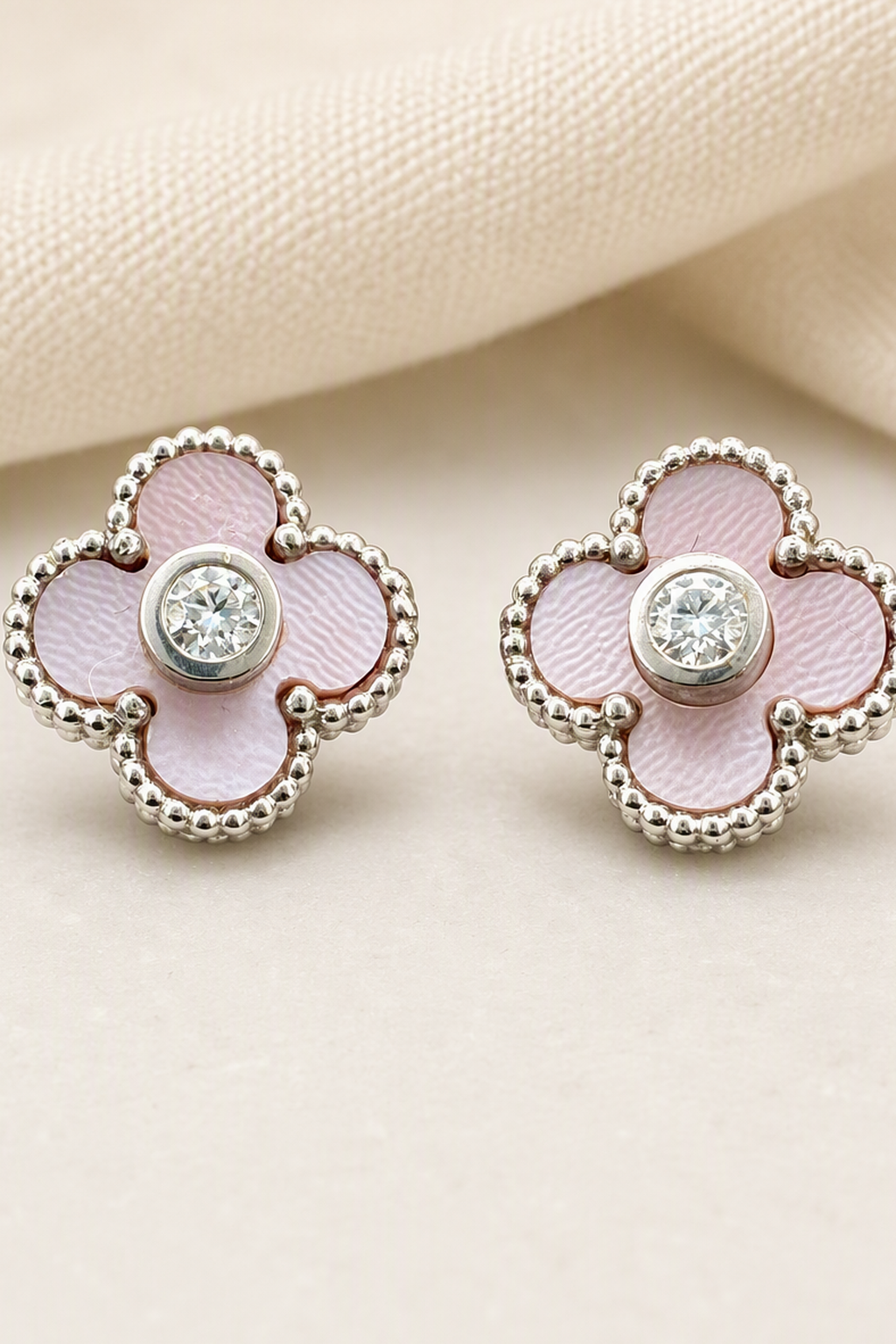 Impimo Natural Pink Mother of Pearl & Moissanite Four-Leaf Clover Stud Earrings - 925 Sterling Silver with 18K White Gold Plating | close-up detail of the setting