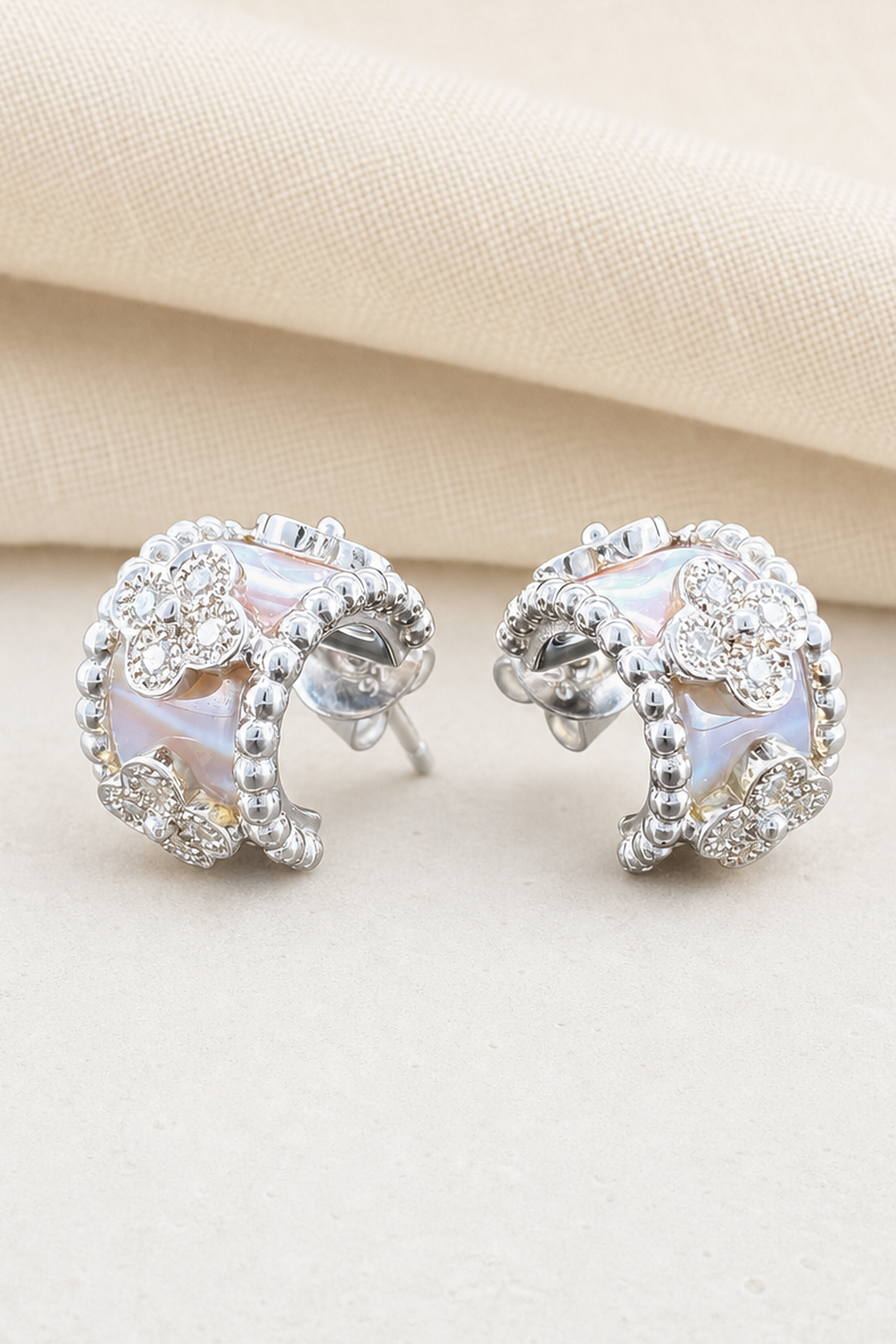 Impimo Natural Mother of Pearl & Moissanite Vintage Bead Earrings - 925 Sterling Silver with 18K White Gold Plating | close-up detail of the setting