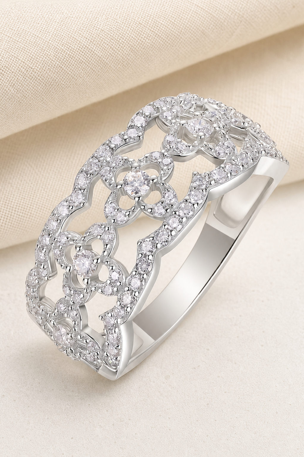 Impimo 0.7 CT (Total) Moissanite Round Cut Ring - 925 Sterling Silver with 18K White Gold Plating | close-up detail of the setting