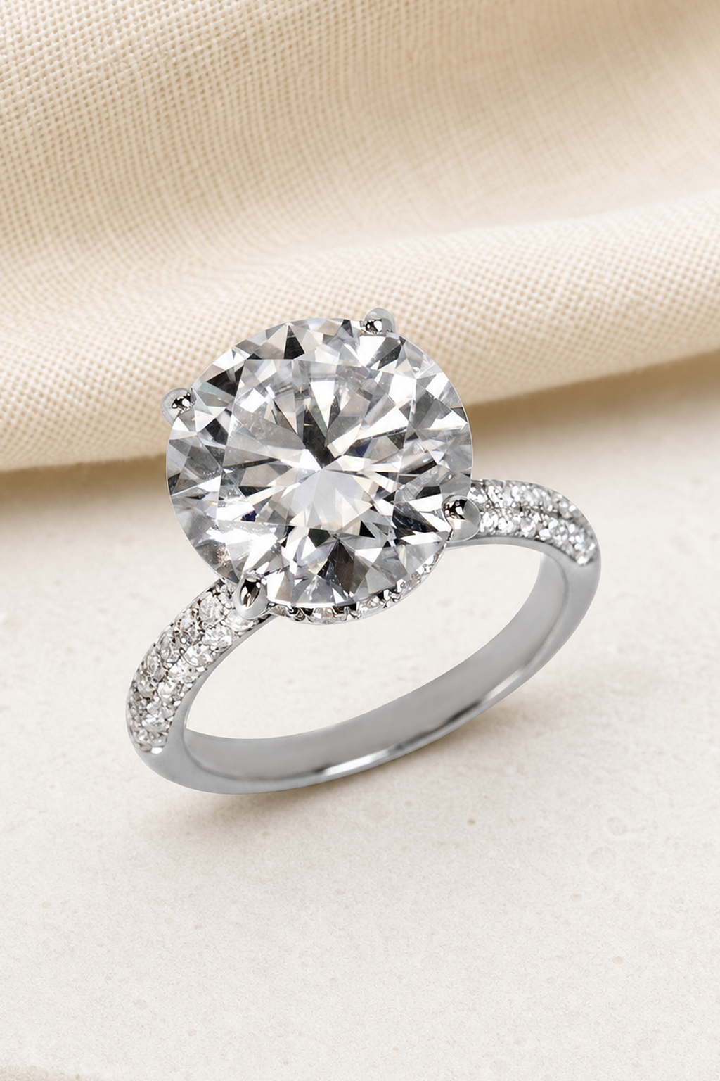 Impimo 10 CT Moissanite Round Cut Ring - Micro Pavé Solitaire - 925 Sterling Silver with 18K White Gold Plating | close-up detail of the setting
