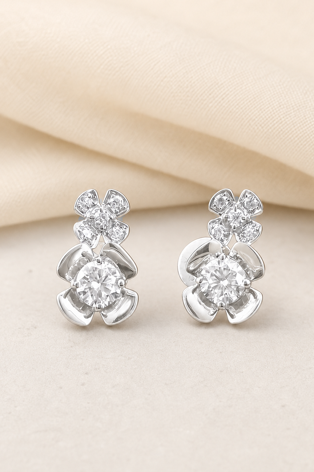 Impimo Moissanite Floral Stud Earrings - 0.6 CT Total (0.3 CT Each) - 925 Silver 18K White Gold | close-up detail of the setting