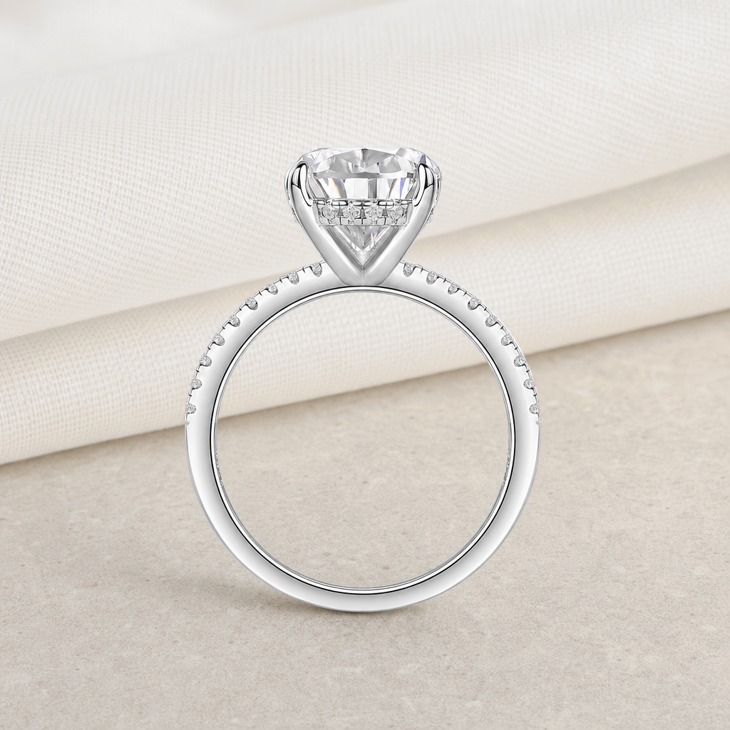 Impimo 4 CT Moissanite Pear Cut Ring - 925 Sterling Silver with 18K White Gold Plating | additional view on ivory linen