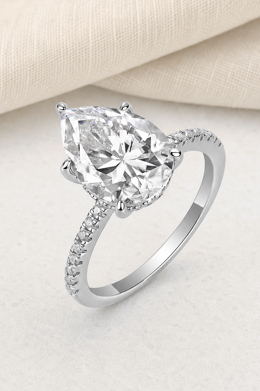 Impimo 4 CT Moissanite Pear Cut Ring - 925 Sterling Silver with 18K White Gold Plating | close-up detail of the setting