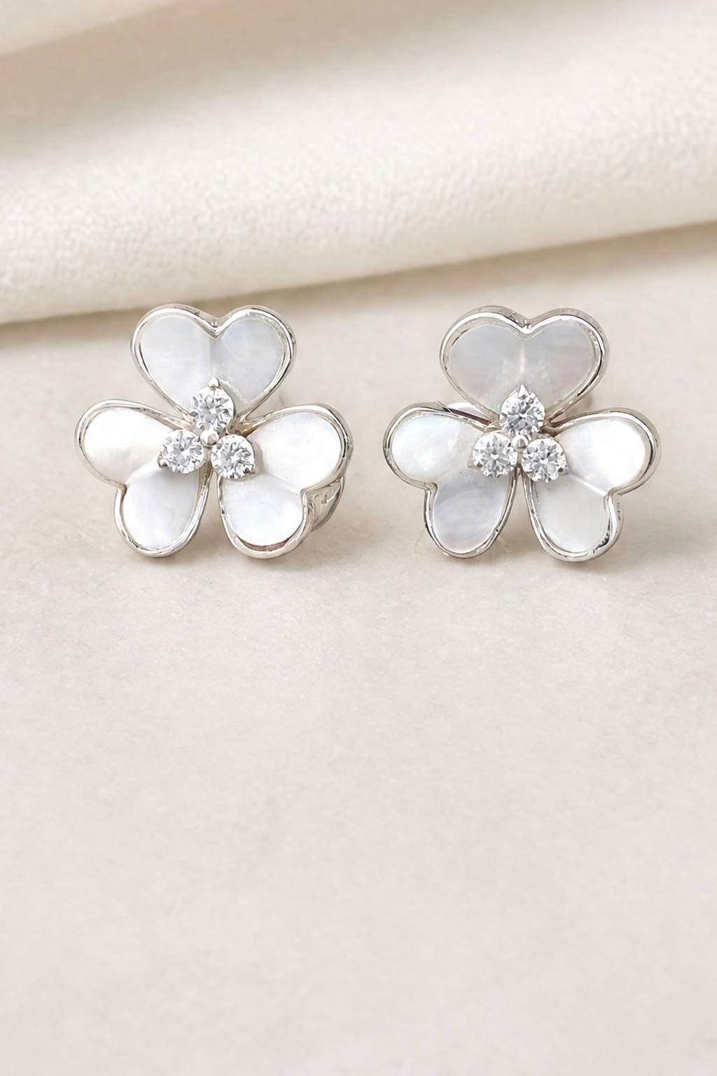 Impimo Natural Mother of Pearl & Moissanite Flower Stud Earrings - 925 Sterling Silver with 18K White Gold Plating — close detail