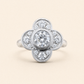 Impimo 1.0 CT Moissanite Floral Ring - 1.6 CT Total - 925 Sterling Silver with 18K White Gold Plating — studio packshot